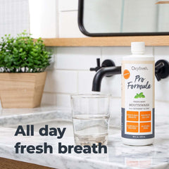 Oxyfresh botella junto a una regla para comparar tamaño y conveniencia