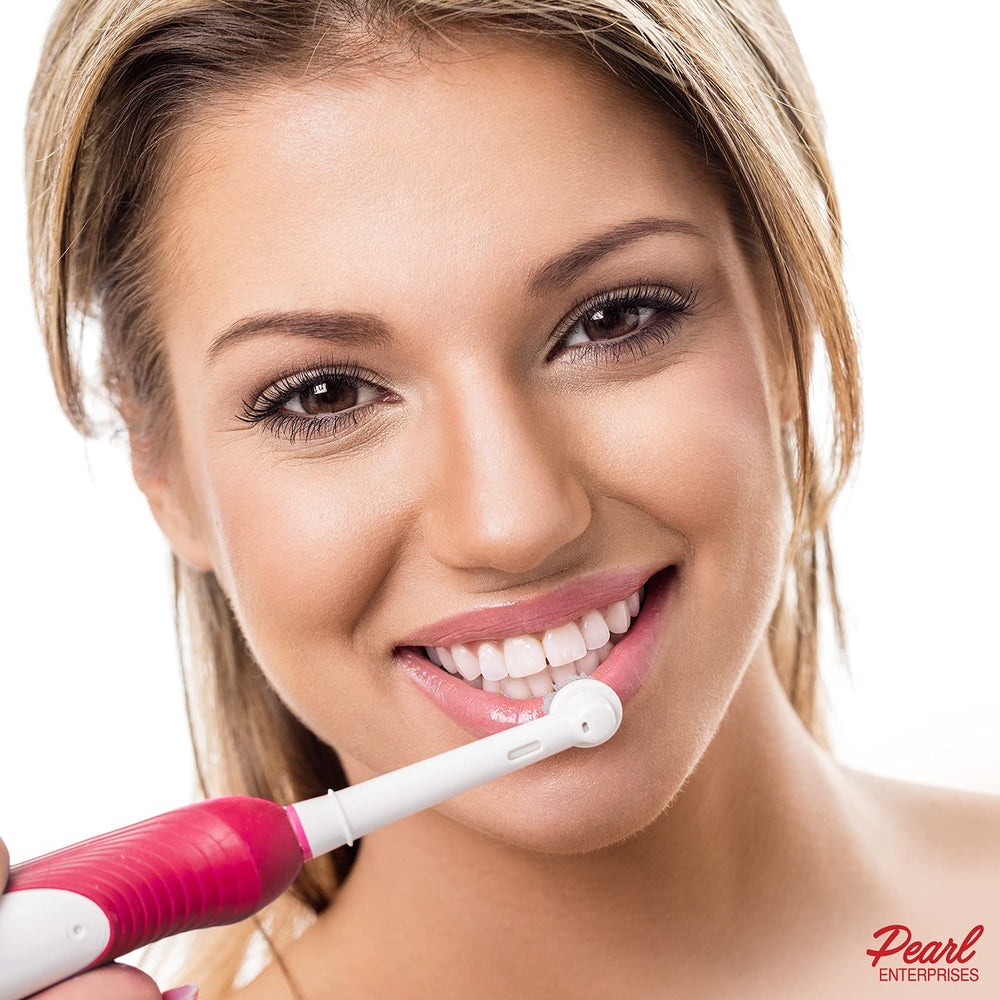 Pearl Enterprises comparación de tamaño junto a un mango Oral-B, muestra compatibilidad