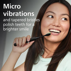 Philips Sonicare cabezales en mano mostrando tamaño portátil