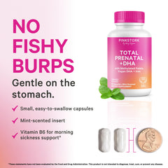 Pink Stork dos cápsulas en mano para comparar tamaño y comodidad