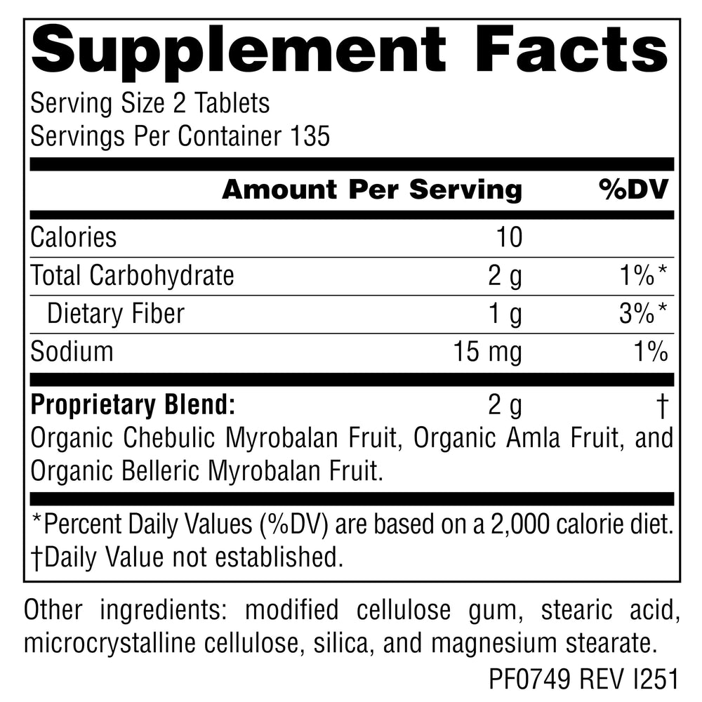Primer plano de una tableta Triphala Planetary Herbals para dosificación clara