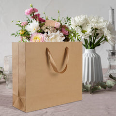 Plauthus bolsa con regalo dentro, ejemplo de uso para eventos y tiendas