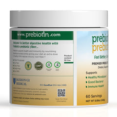 Prebiotin disuelto en un vaso de agua, marca Prebiotin mostrando mezcla transparente y fácil