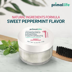 Primal Life Organics envase junto a una moneda para comparar tamaño