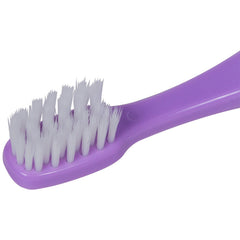 PRO-SYS cepillo en uso sobre dientes, proporciona higiene delicada