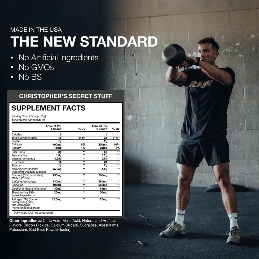 Glass with RAW Christopher's Secret Stuff mixing into a refreshing pre-workout drink