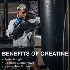RAW Nutrition creatine monohydrate powder in a glass of water for quick dissolution