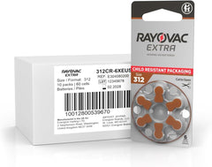 Pila Rayovac 312 insertada en audífono, garantiza alimentación estable