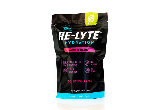 REDMOND paquete Re-Lyte frente mostrando 30 sobres y sabor berry mixto, hidratación práctica