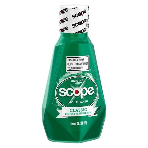 Scope etiqueta y tapa en primer plano destacando uso portátil y confianza