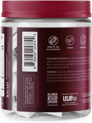 Gomitas Snap Supplements junto a portátil, ideal para rutinas en la oficina