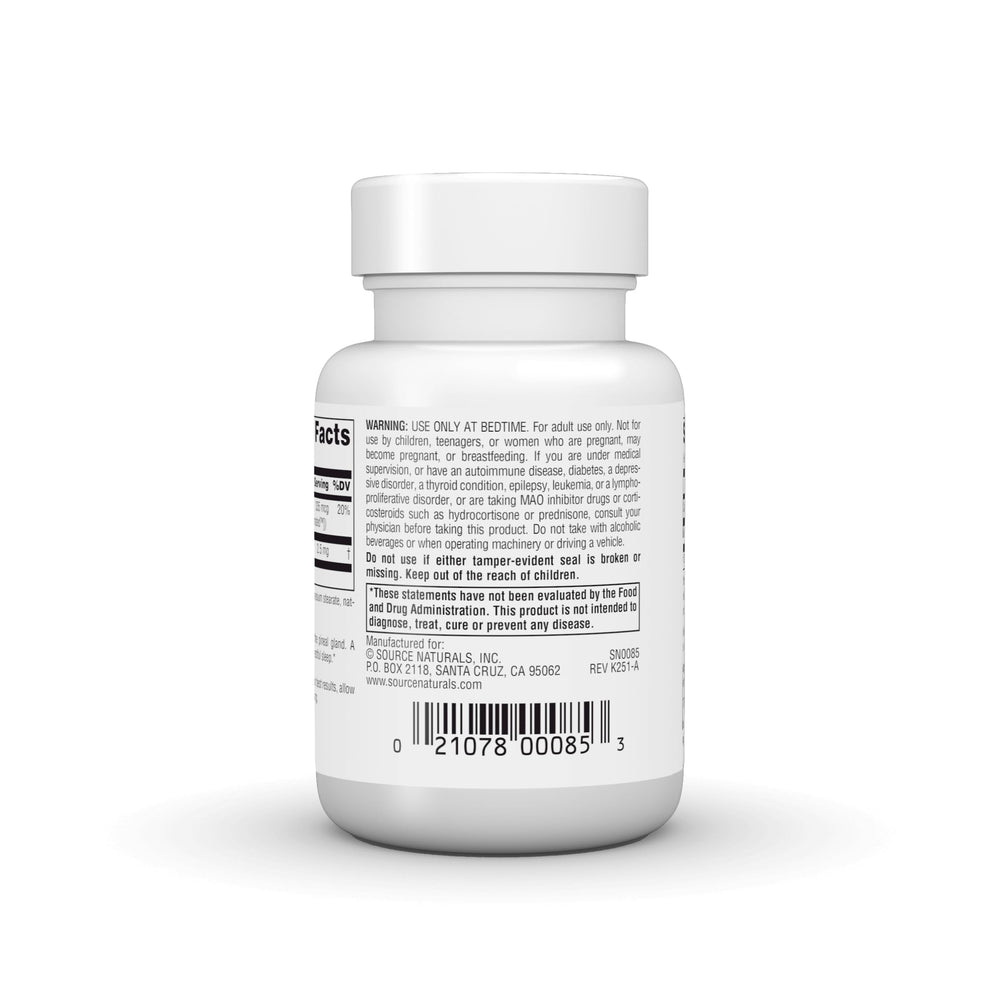 Source Naturals pastilla junto a mano para comparar tamaño y dosificación clara