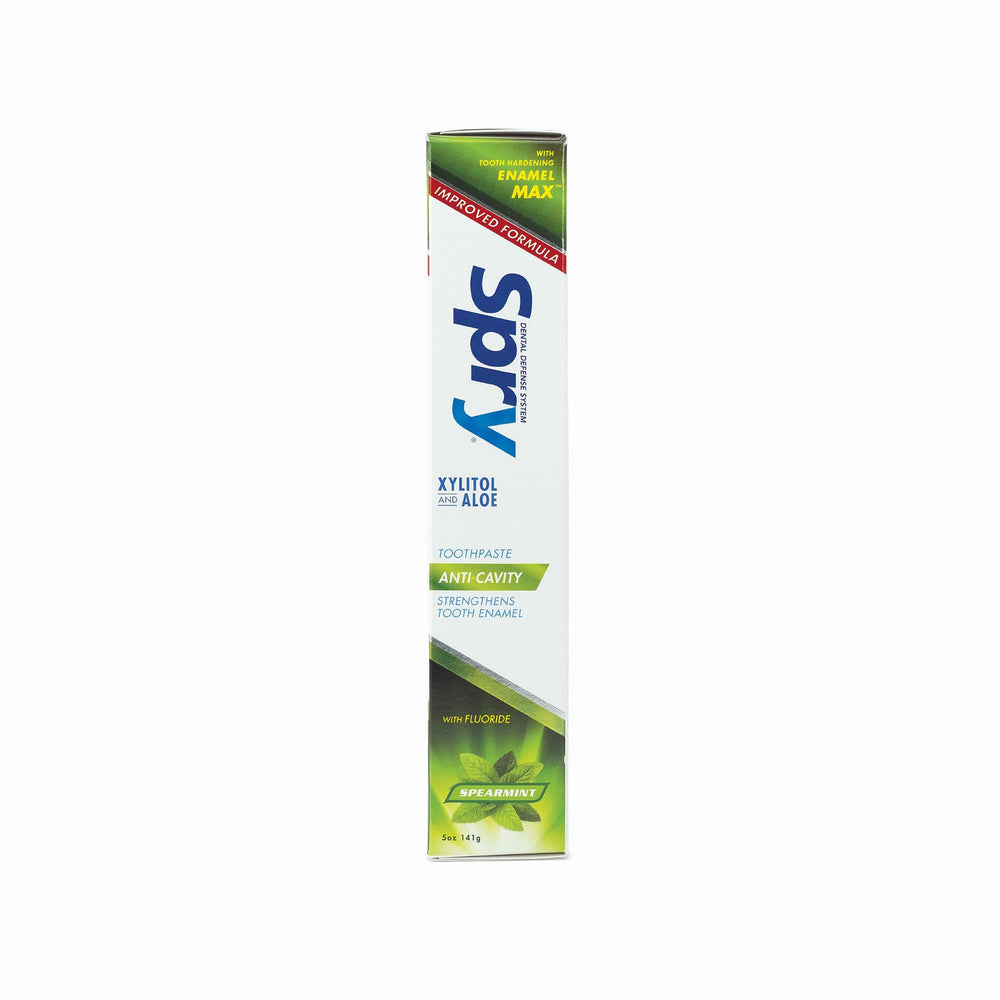 Spry tubo junto a regla para comparar el tamaño de 5 oz