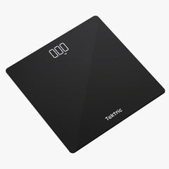 Tektric comparación de tamaño con una mano para mostrar escala compacta