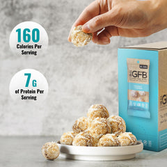 The GFB Coconut Cashew Protein Bites on hand, satisfying bite.