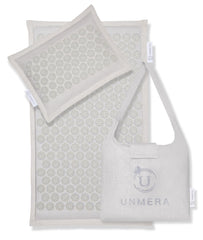UNMERA esterilla vista frontal mostrando cobertura y diseño, ayuda a relajar espalda