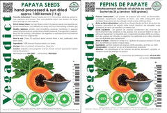Vegaddict semillas junto a papaya fresca para mostrar origen e ingredientes