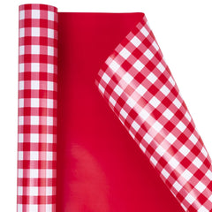 WRAPAHOLIC en uso envolviendo caja de regalo, ofrece acabados limpios y apariencia festiva
