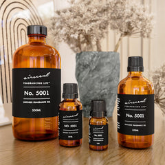 Air-Scent botella junto a objeto cotidiano para comparar tamaño, práctica 120 mL