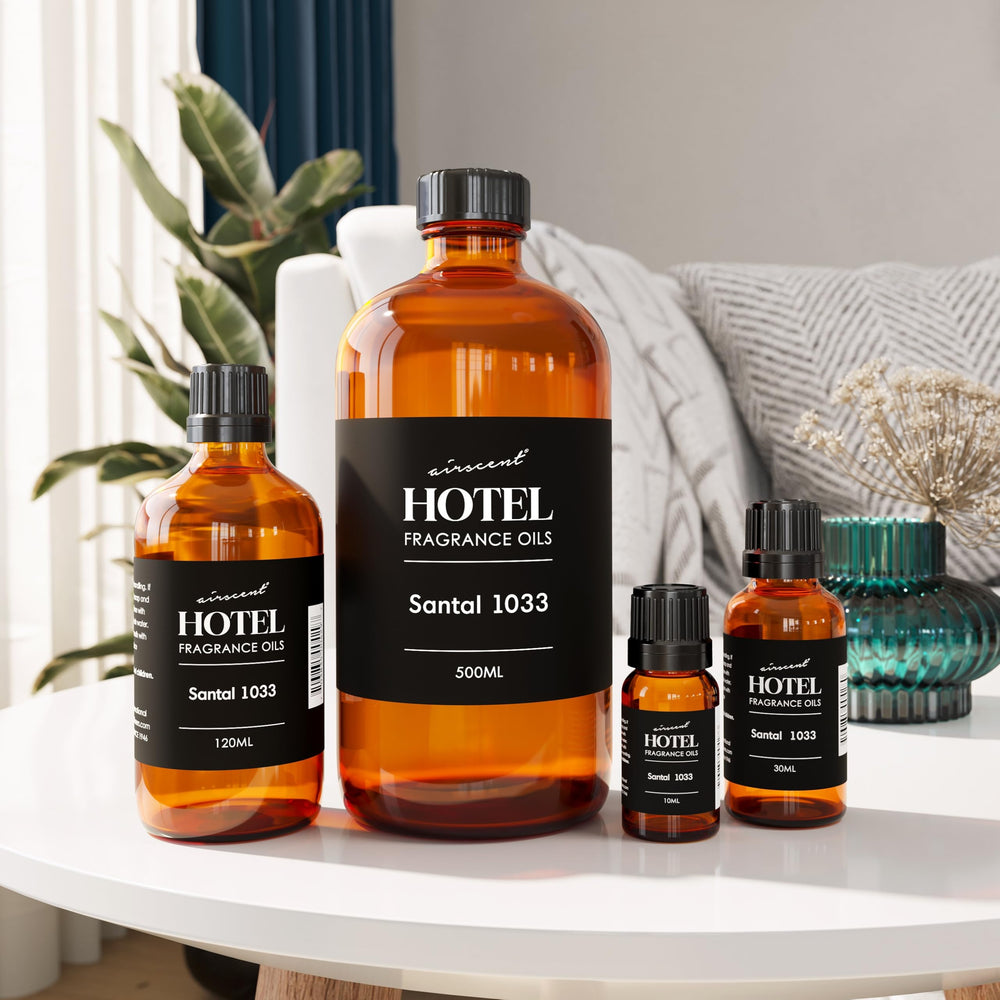 Air-Scent botella 30 ml junto a moneda para comparar tamaño