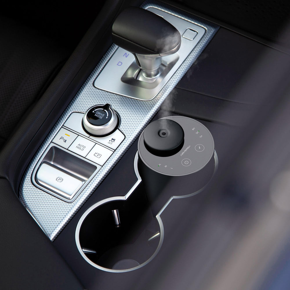 Airversa ANX en interior de coche, perfuma viajes largos y mantiene ambiente
