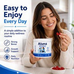 Aluna gomitas gomita en mano, formato masticable para niños cómodo