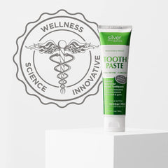 American Biotech Labs tubo de 4 oz junto a objetos para comparar tamaño