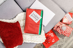 American Greetings caja en mano muestra escala y capacidad práctica