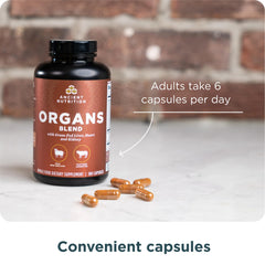 Ancient Nutrition comparación de tamaño con moneda para visualizar cantidad por cápsula