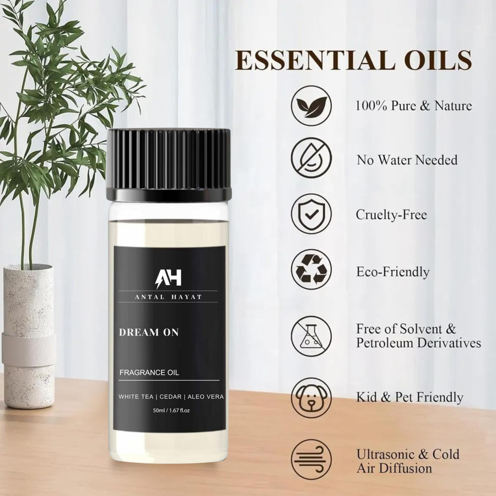 Dream On bottle beside a diffuser in a cozy living room for relaxation.