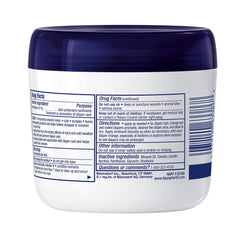 Escena de cuidado de bebé con Aquaphor junto a cambiador y productos suaves
