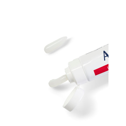 Aquaphor tubo frontal 2 oz mostrando producto y alivio rápido