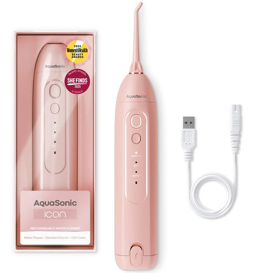 AquaSonic vista frontal del irrigador rosa blush con diseño elegante y portátil