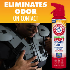Arm & Hammer envase junto a una regla para comparación de tamaño