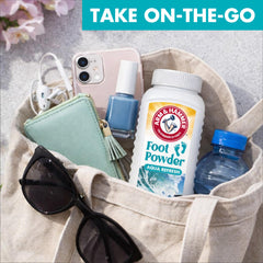 Arm & Hammer frasco en mano para comparar tamaño portátil y conveniencia
