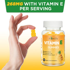 Aromlife porción de dos gomitas en la mano para control de dosis portátil