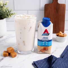 Atkins etiqueta nutricional visible con información de proteínas y carbohidratos