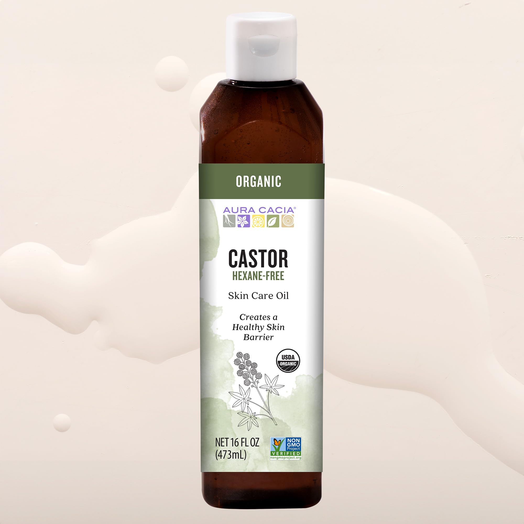Aura Cacia botella 16 fl. oz. junto a objetos para comparar tamaño práctico