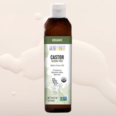 Aura Cacia botella 16 fl. oz. junto a objetos para comparar tamaño práctico
