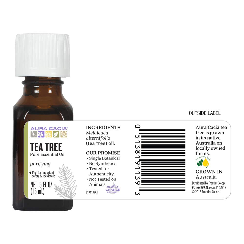 Aura Cacia frasco junto a objeto de referencia para comparar tamaño