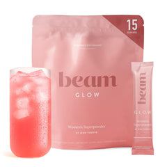 BEAM bote Glow al frente con etiqueta visible y beneficio de apoyo hormonal