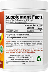 Best Naturals botella comparada con mano para referencia de tamaño