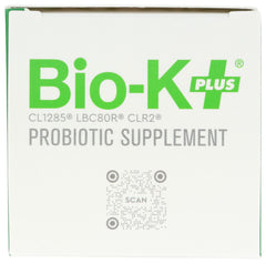 Bio-K Plus cápsula en mano mostrando el tamaño y la dosis diaria