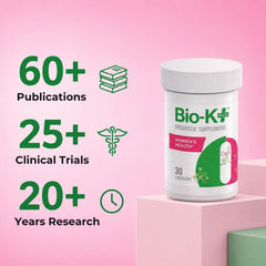 Bio-K Plus cápsulas sobre fondo blanco mostrando textura y acabado vegano