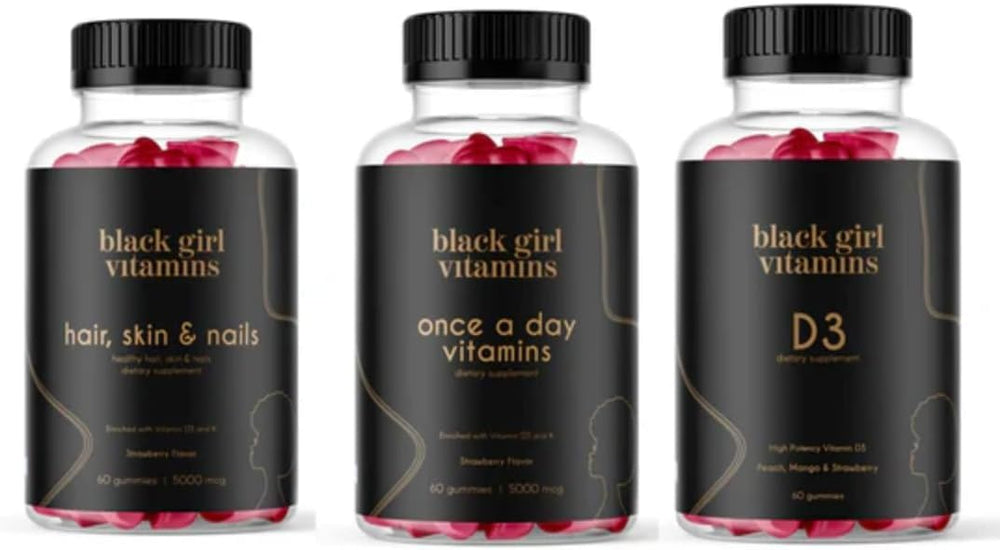 Black Girl Vitamins frontal del paquete mostrando las tres botellas y beneficios