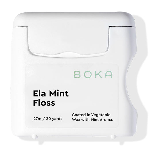 Boka envase frontal mostrando hilo dental expandible y fácil dispensado