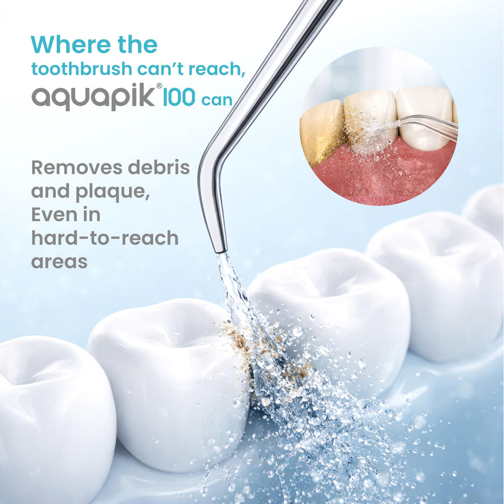 Bostontech Aquapik 100 comparación de tamaño junto a cepillo, escala real