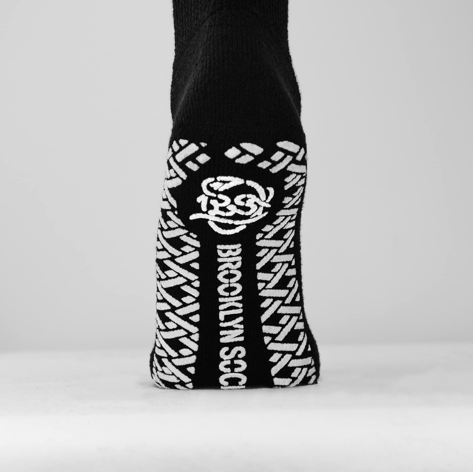 Brooklyn Socks detalle de la suela con grippers que mejora la tracción interior