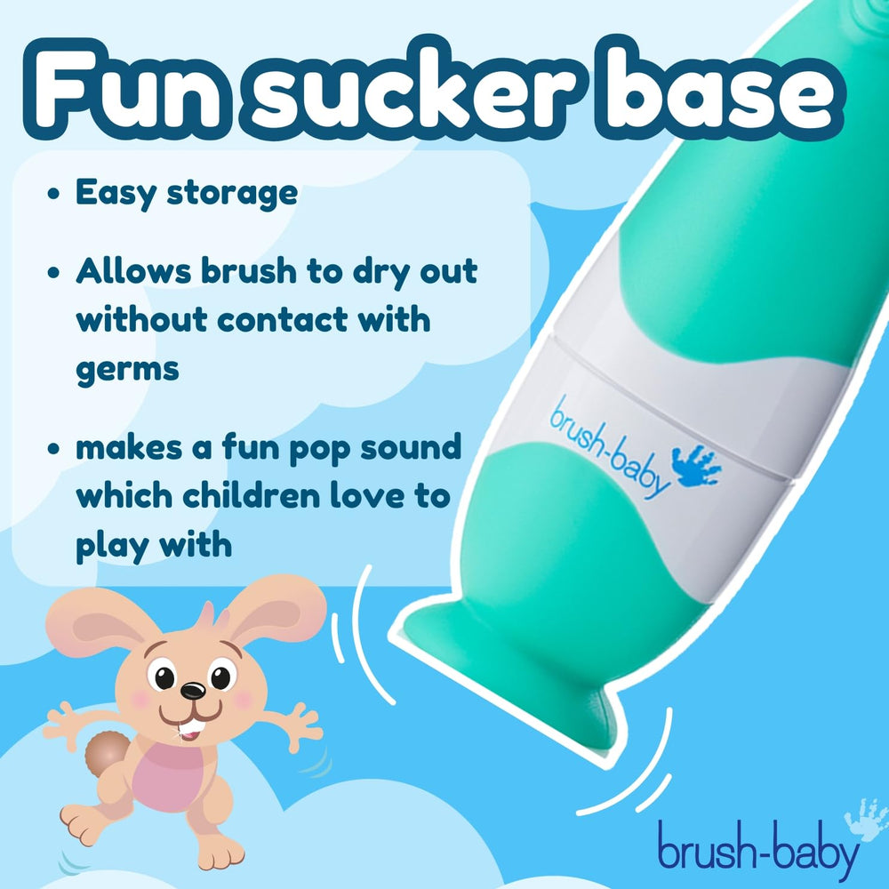 brush-baby tamaño del cepillo junto a un juguete para referencia