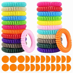 BuggyBands paquete frontal mostrando 24 pulseras coloridas y 60 stickers, protección práctica